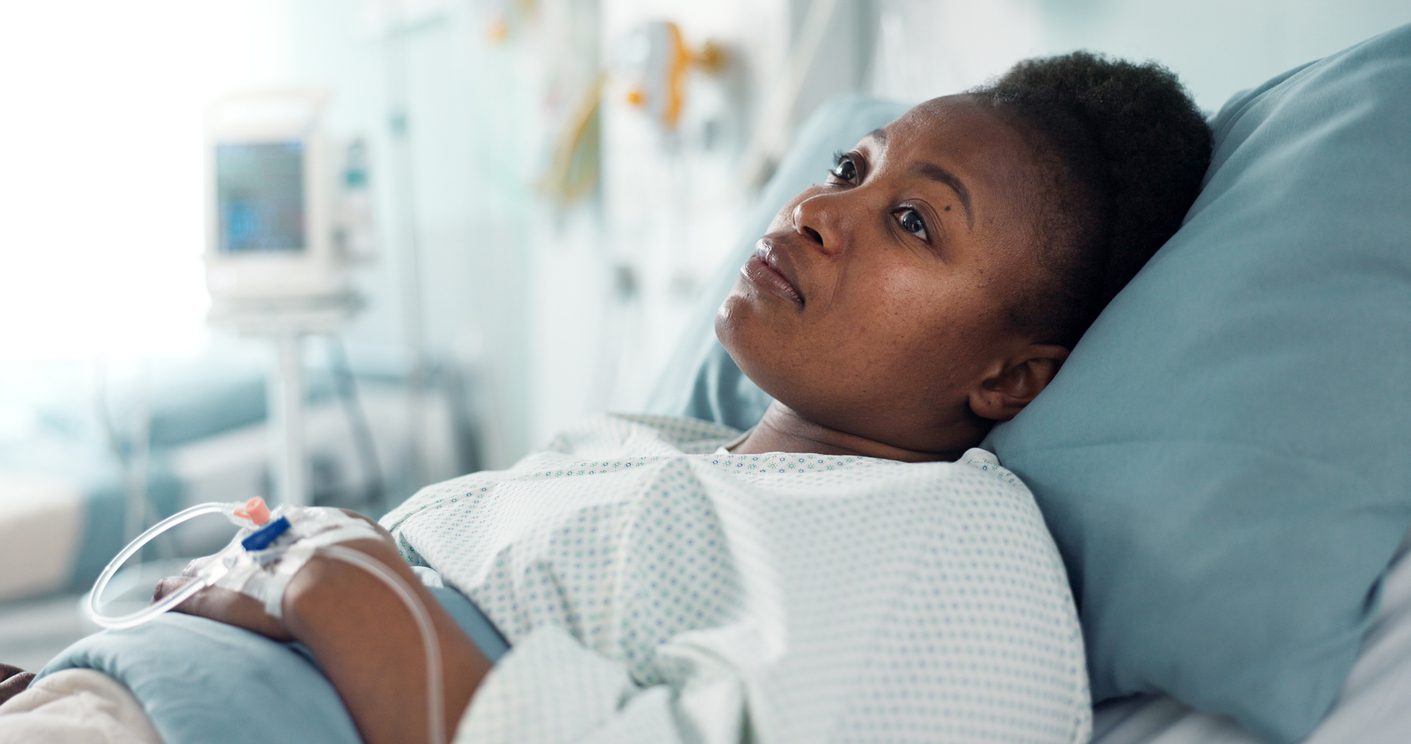 Woman in Hospital Bed